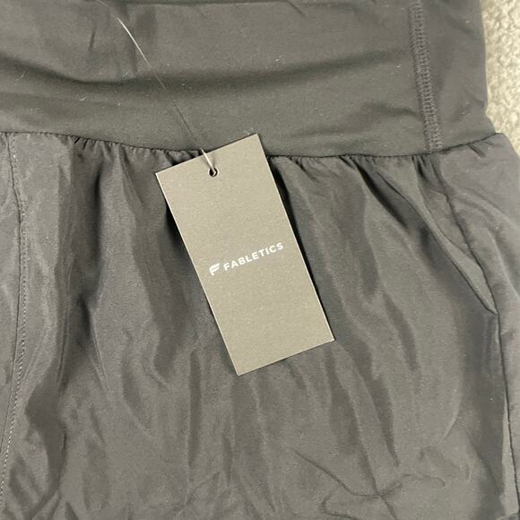 Fabletics Women's Large Black Polyester Elastane Nylon Sun Chaser 4in Short - Picture 2 of 11